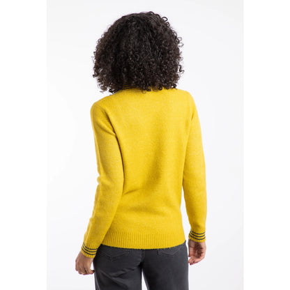 Back view of a woman wearing a yellow Weird Fish Dawkins knitted jumper on a white background