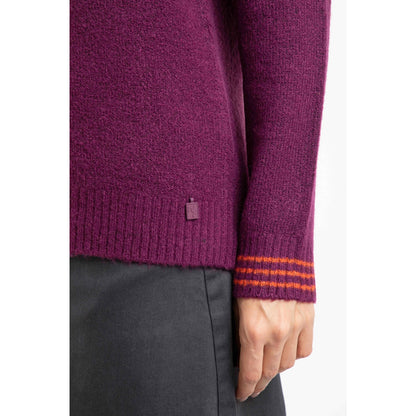 Close-up of a Weird Fish womens Dawkins jumper stripe cuff in Beet Purple with a brand logo on a white background