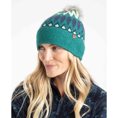 Woman wearing a Weird Fish Ivy Green knitted Frady beanie with a Fair Isle pattern on a white background