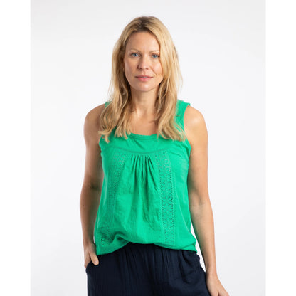 Front view of a woman wearing a Weird Fish Chelle square neck vest in Gumdrop Green with lace front trim
