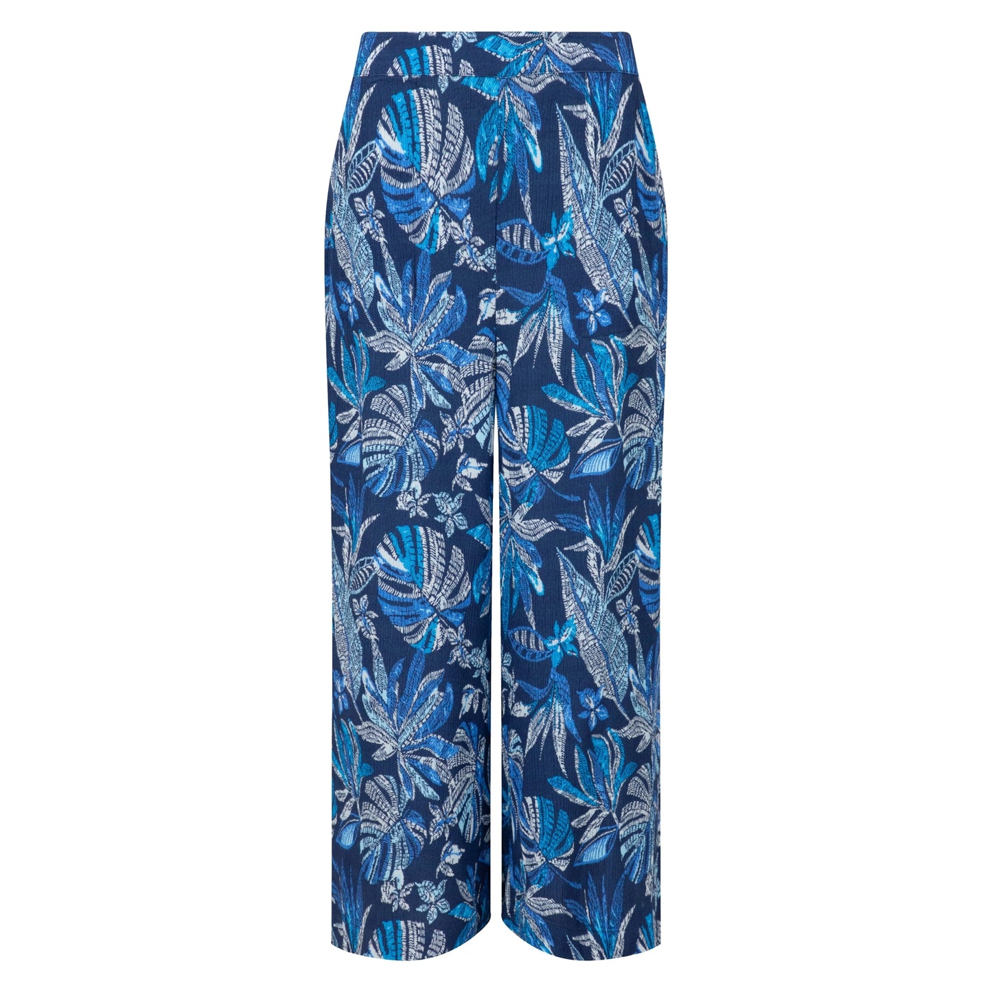Front view of a pair of Weird Fish Sarita wide leg crinkle viscose cropped trousers in indigo blue with a tropical leaf pattern.
