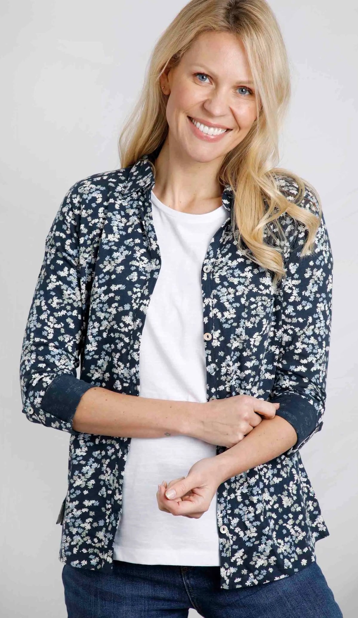 Weird Fish womens Ginny floral shirt in Ink navy with white flowers worn over white tee