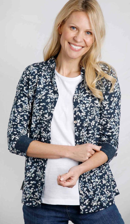 Weird Fish womens Ginny floral shirt in Ink navy with white flowers worn over white tee