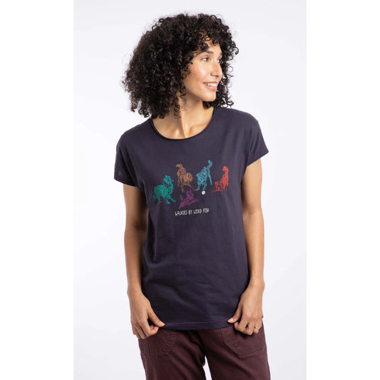 Woman wearing a dark blue t-shirt with colorful graphic design on a white background