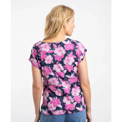 Back view of a woman wearing a short sleeve Weird Fish Paw Paw t-shirt with a pink floral print on a white background