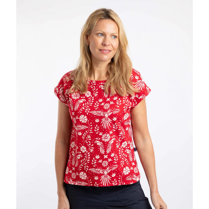 Front view of a woman wearing a Weird Fish short sleeve Paw Paw tee in Rich red with a white floral and parrot print on a white background