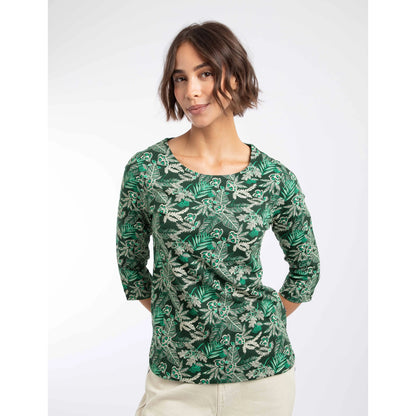 Front view of a woman wearing a Weird Fish three-quarter sleeve Pinto t-shirt in Laurel Green with a leafy floral pattern.