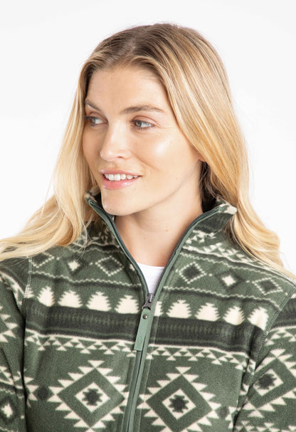 Close-up view of a woman wearing a Weird Fish full zip Rochelle fleece in Deep Lichen Green with an Aztec pattern.