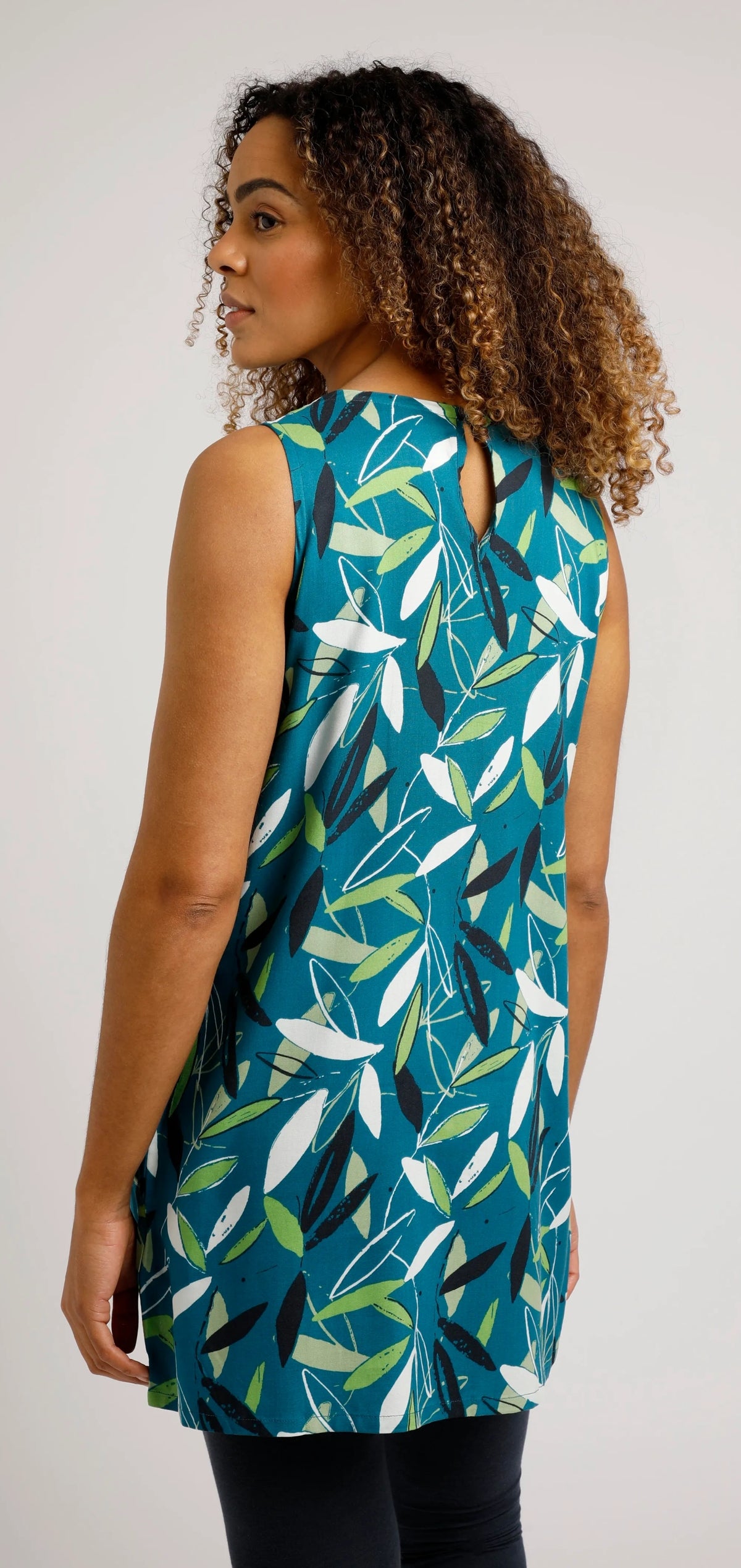 Women's Weird Fish sleeveless Juhi tunic in Deep Sea Blue with a leaf print.