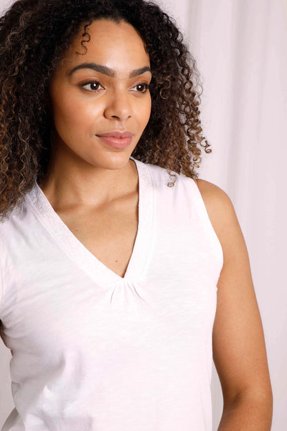 Women's white Arenas vest from Weird Fish with embroidered v-shape neckline.