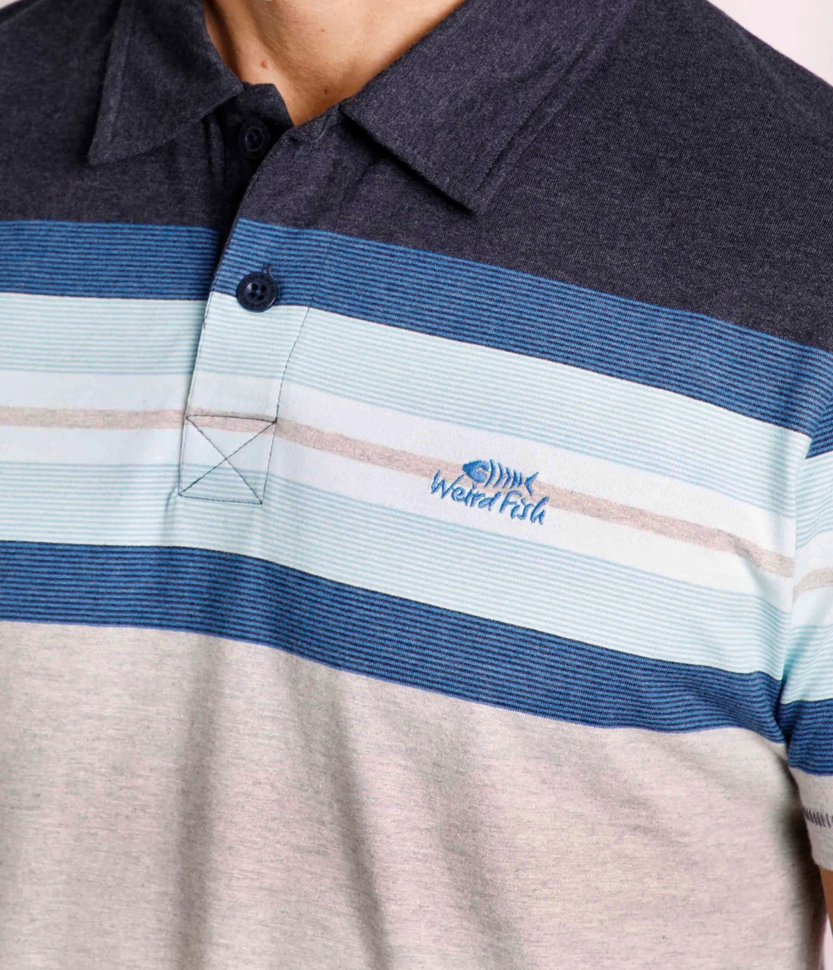 Men's Weird Fish short sleeve Albury style polo shirt from Weird Fish with chest stripes and button neckline in Sky Blue.
