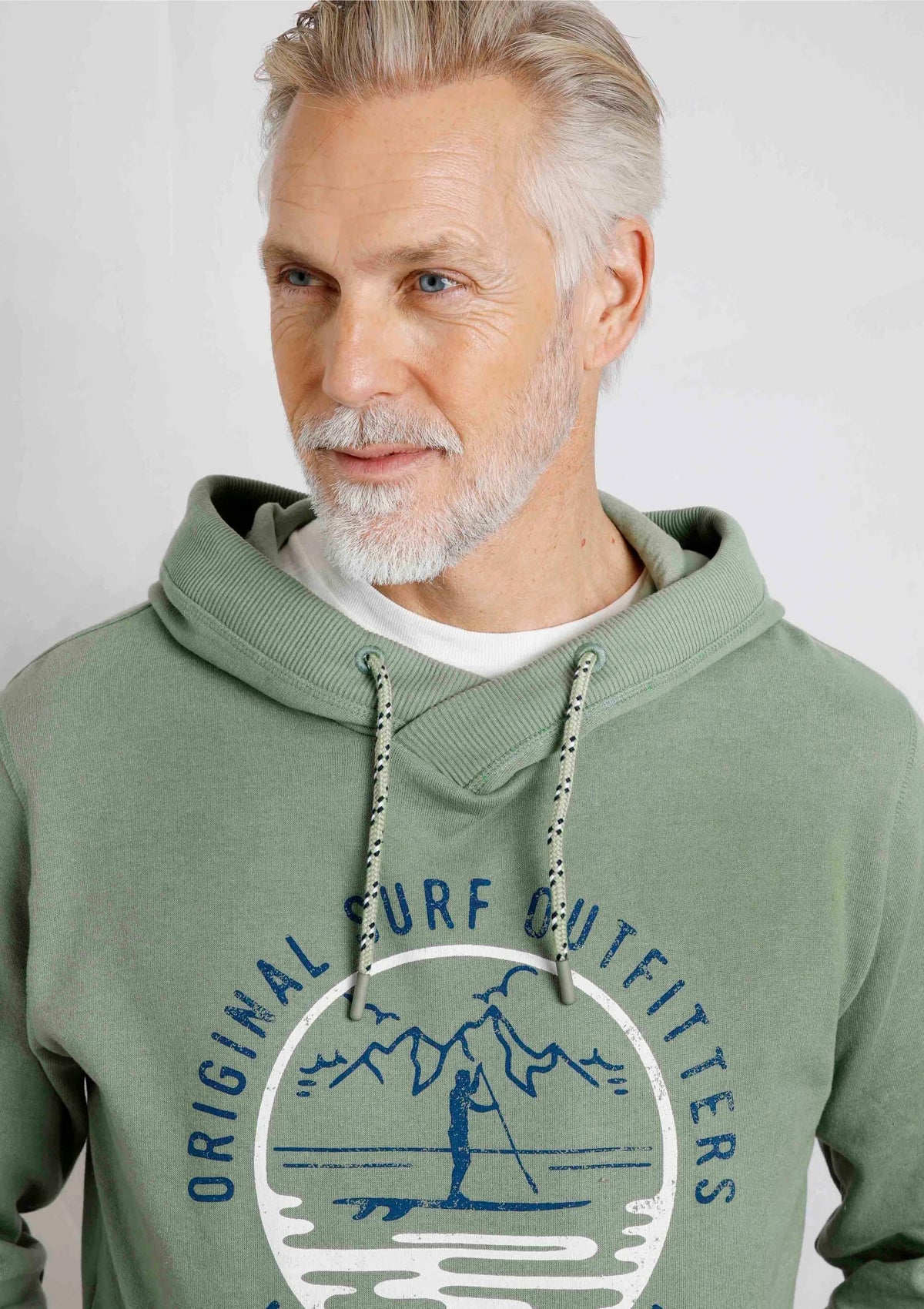 Men's Bryant pop over hoodie from Weird Fish in Pistachio Green with paddleboarder logo printed on the chest.