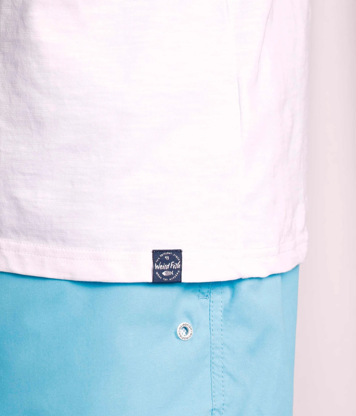 Weird Fish men's white Fin printed tee with hem logo label.