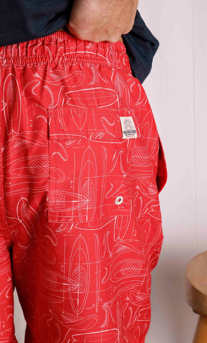Men's Belukha Weird Fish swim shorts in Radical Red with Velcro back pocket.