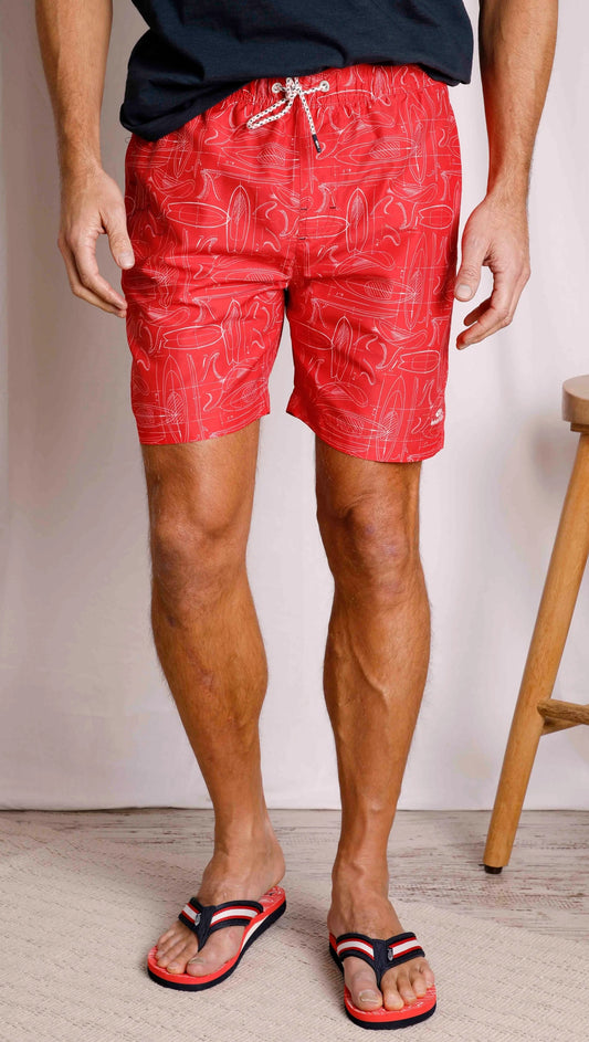 Weird Fish men's Belukha swim shorts in Radical Red with a surf and paddleboard print.
