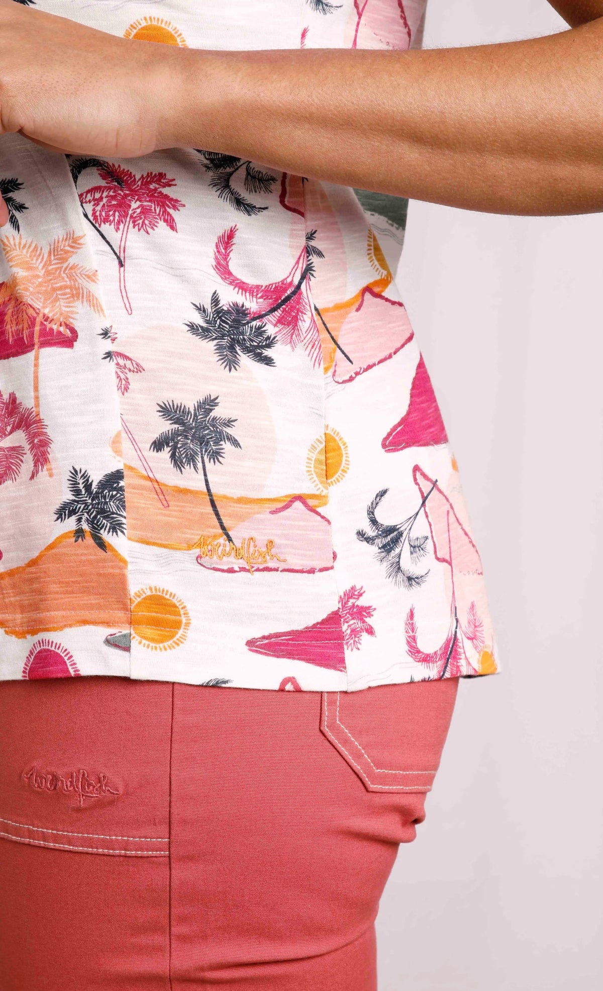 Weird Fish women's tropical print Sonora vest with embroidered logo by the hem.