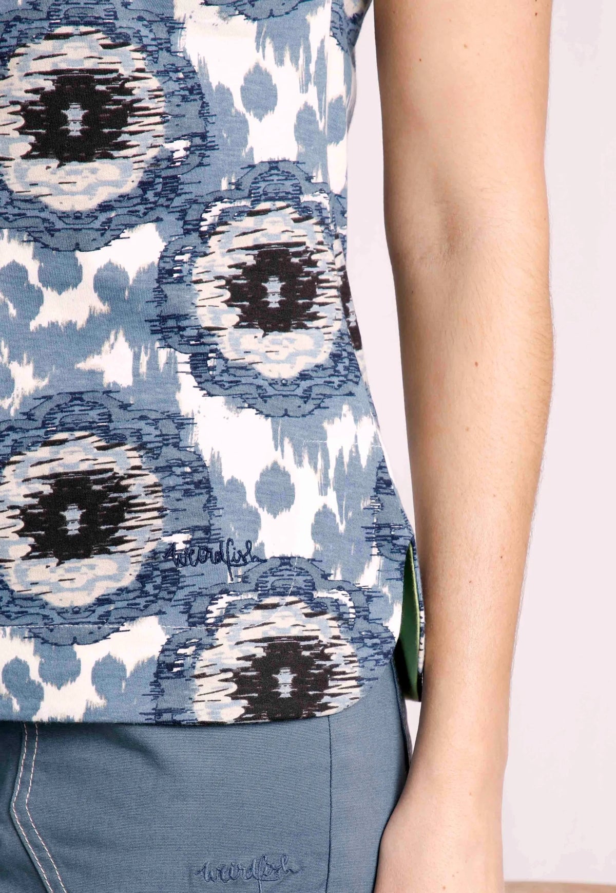Women's Paw Paw tee from Weird Fish in Pale Denim Blue circular print with curved side seam hems.