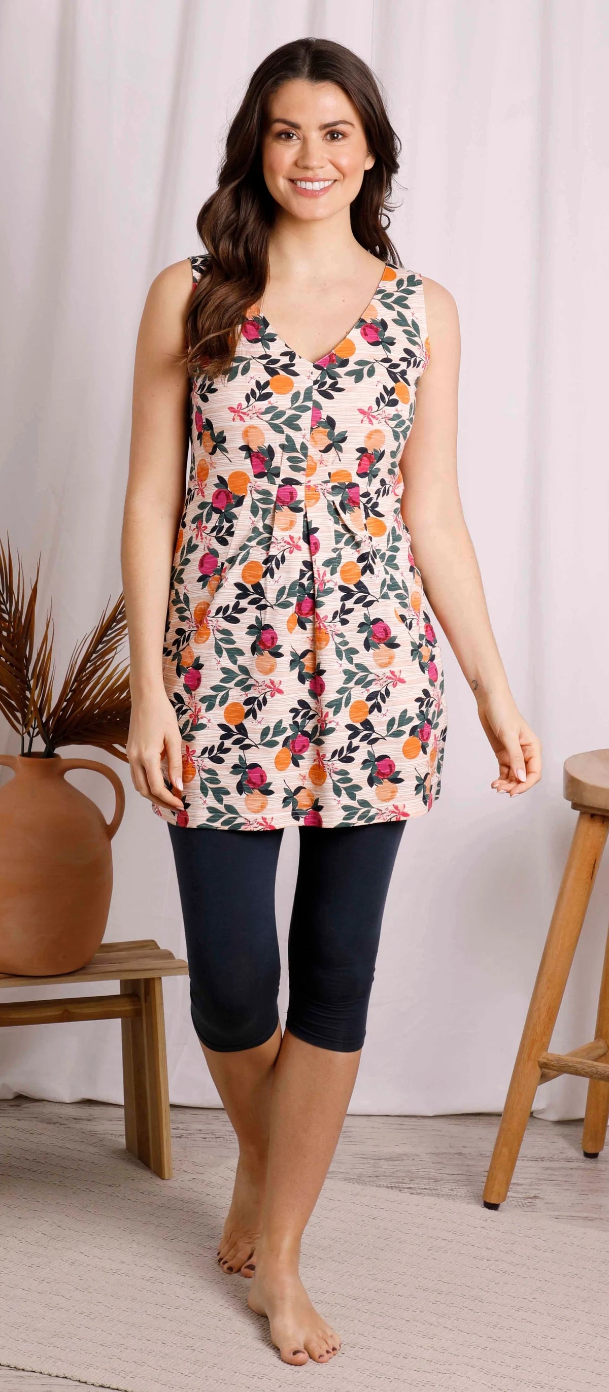 Women's v-neck sleeveless Indus tunic from Weird Fish in a Cantaloupe fruit print.