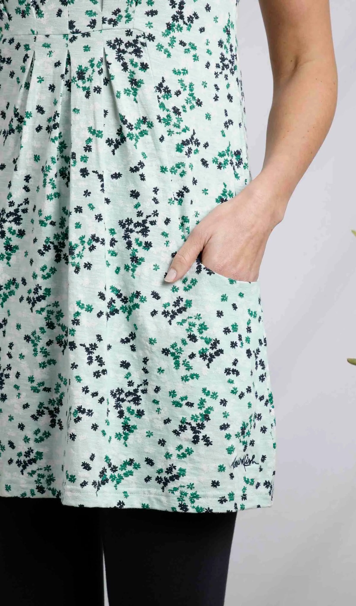 Weird Fish women's Indus jersey tunic in Mint Green with a ditsy floral print and front pockets.
