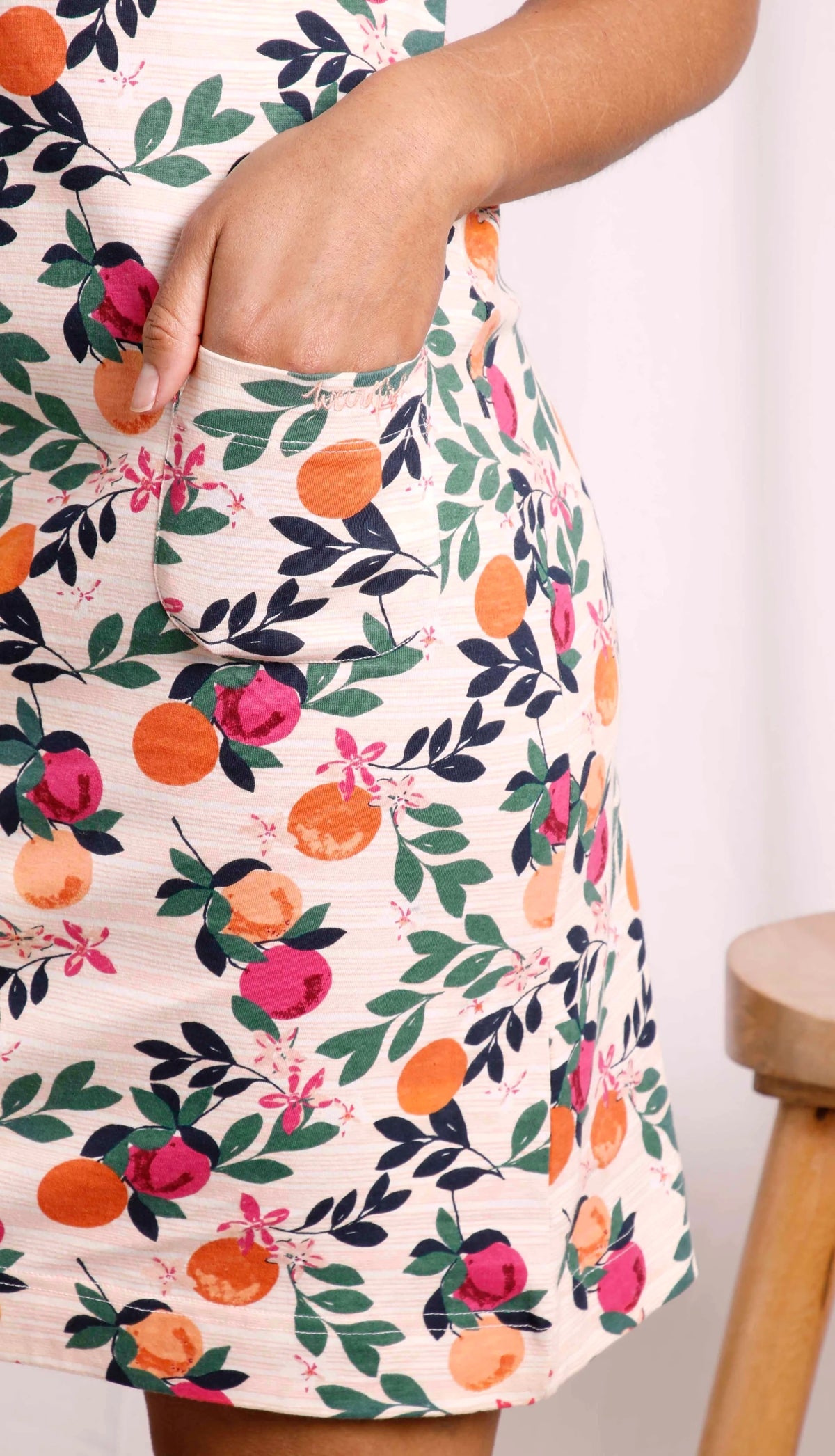 Women's Tallahassee cotton jersey dress from Weird Fish with a Cantaloupe fruit pattern and front pockets.