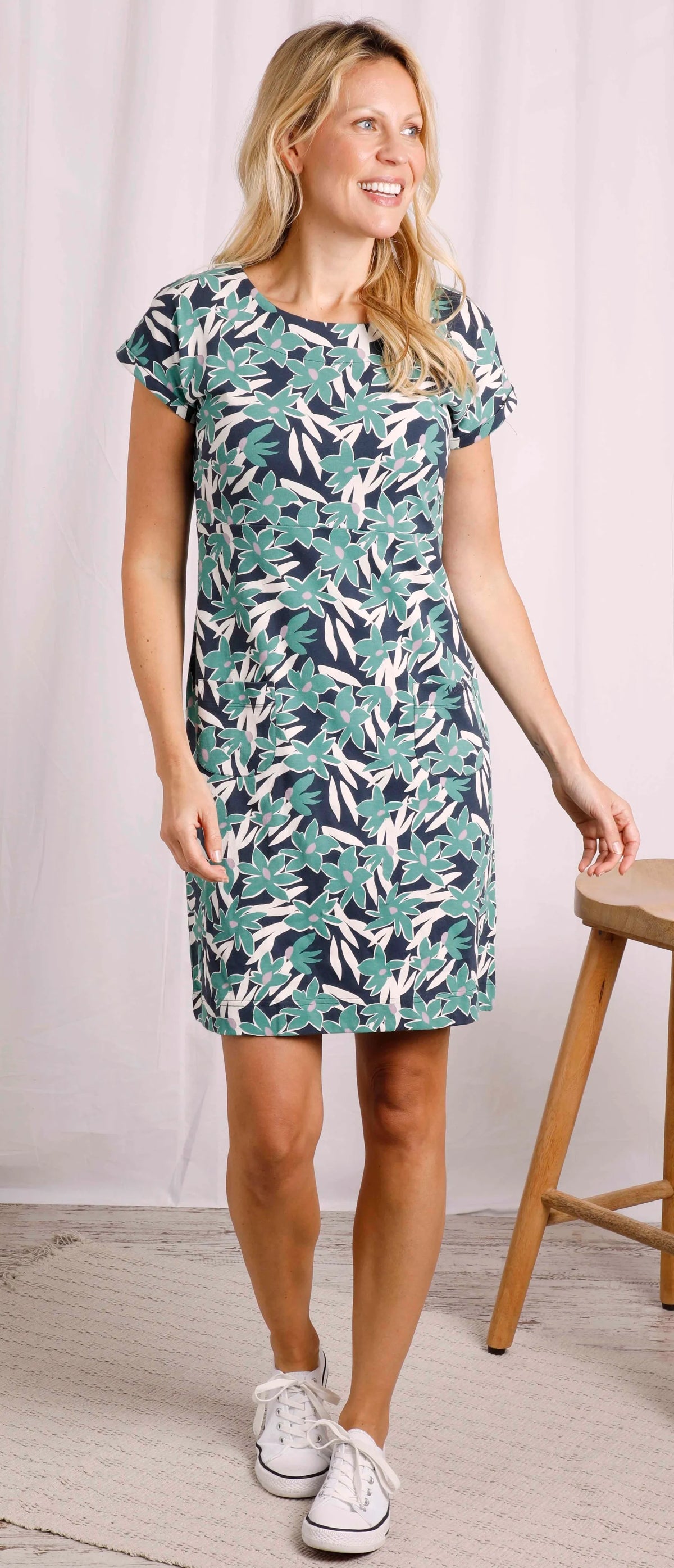 Weird Fish women's short sleeve Tallahassee jersey dress in a Dark Jade Green floral print.