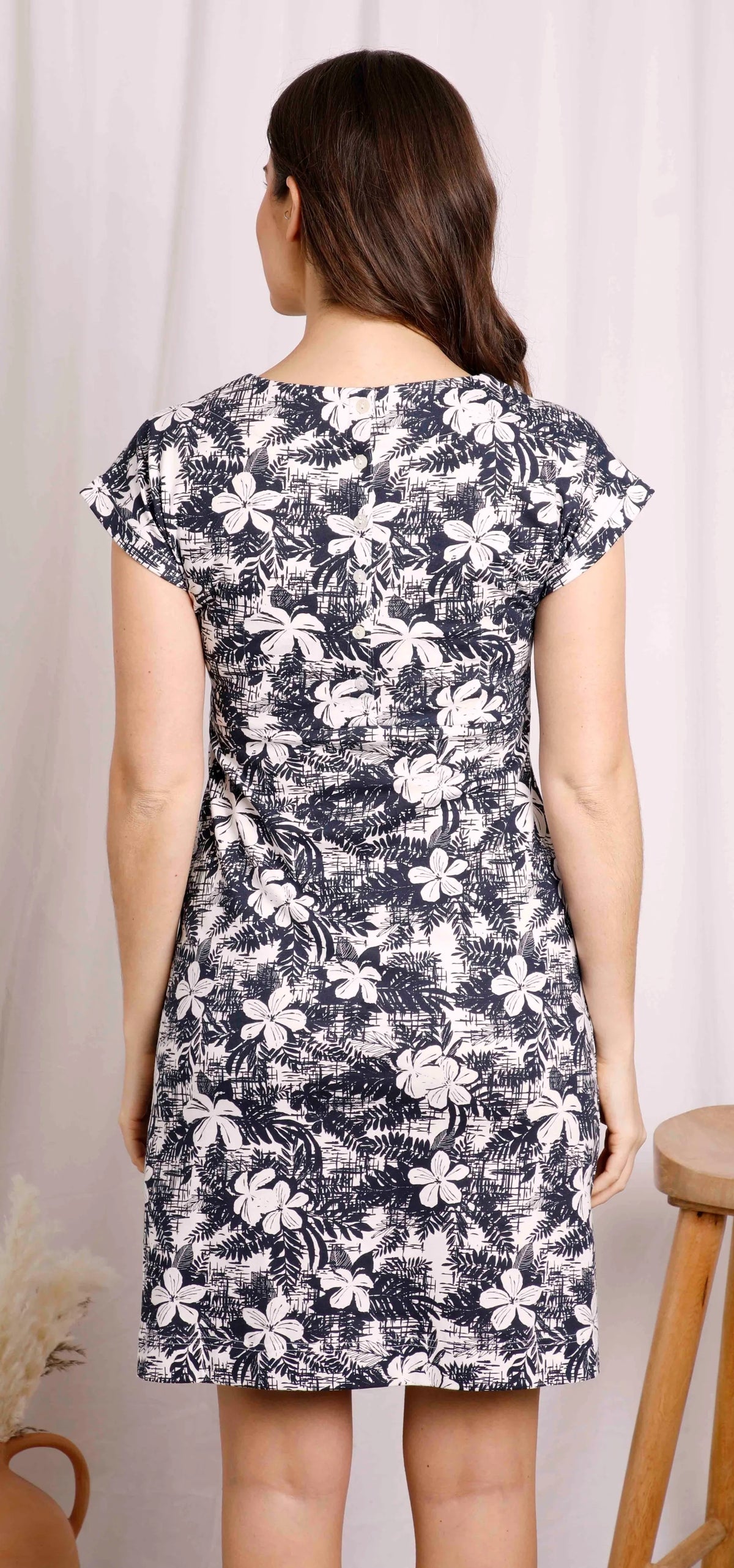 Women's Tallahassee short sleeve jersey dress from Weird Fish in Dark Denim Blue with a White floral pattern.