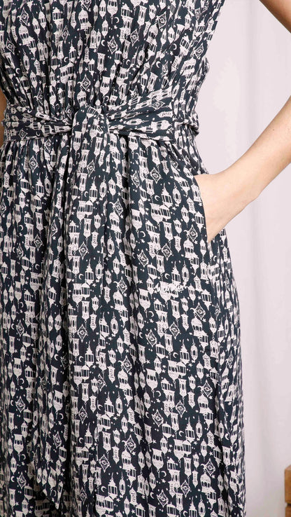 Roxi women's culotte jumpsuit from Weird Fish in Navy with lantern print and hip pockets.