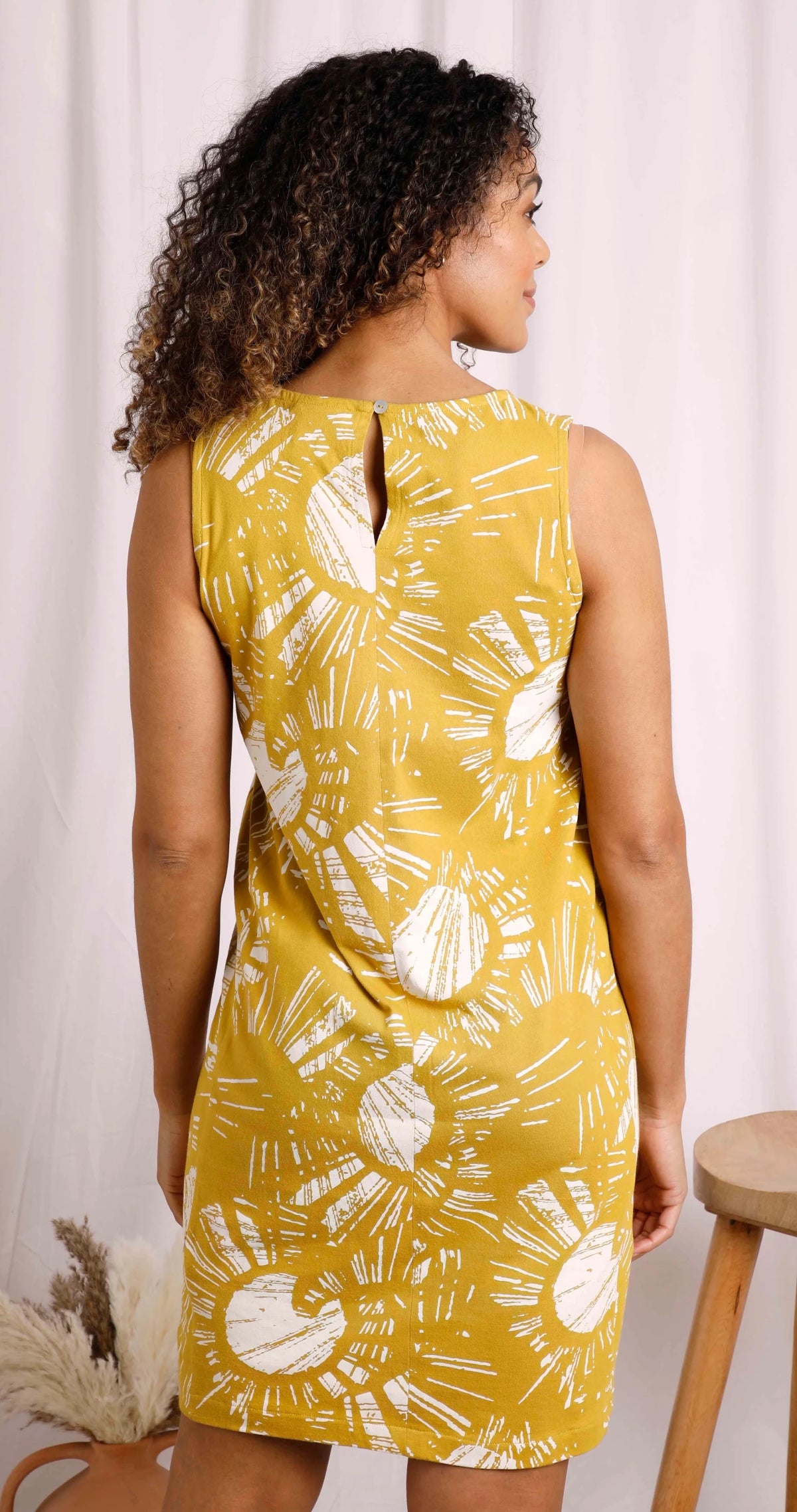 Women's Adena dress from Weird Fish in Warm Olive with a bold floral pattern.