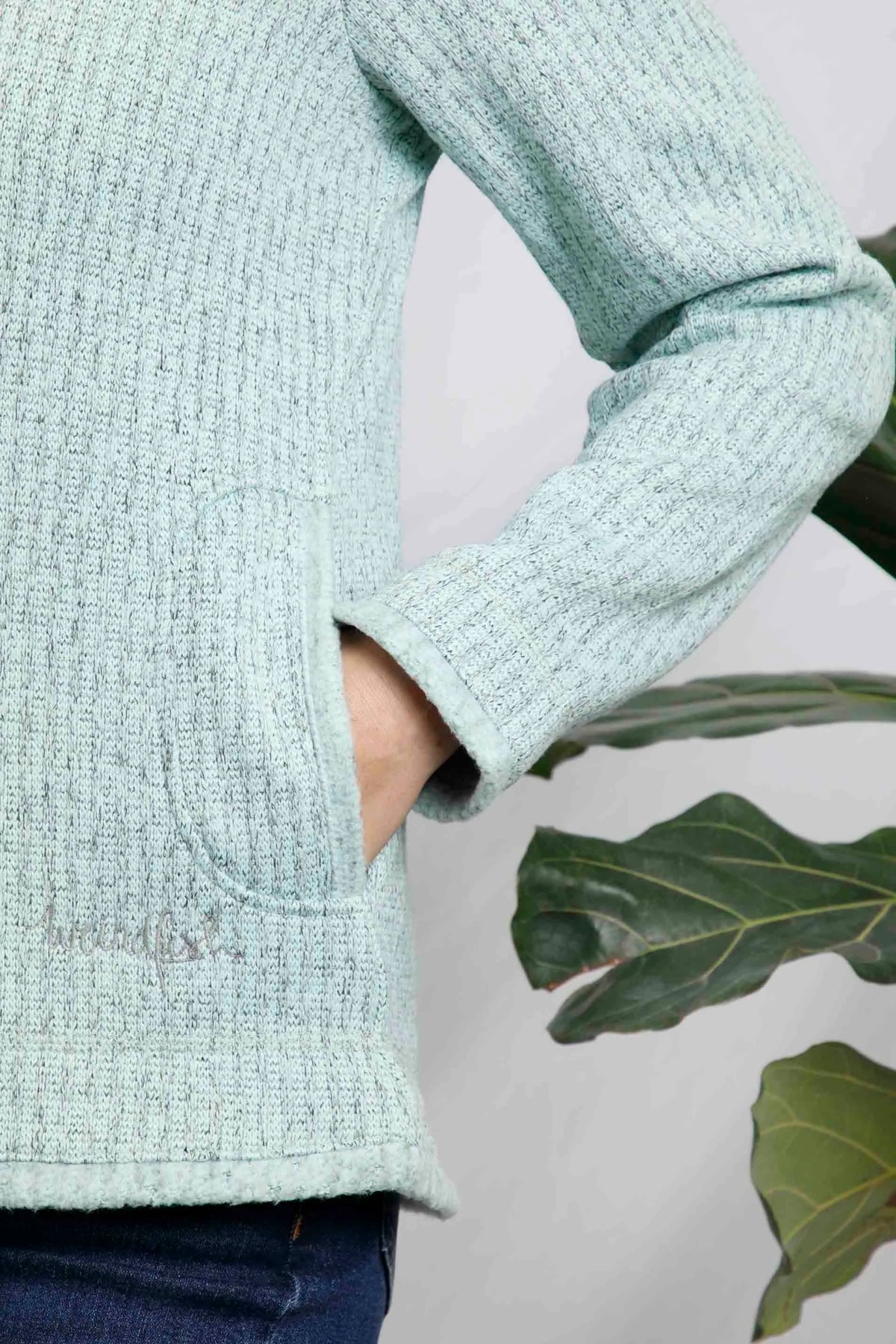 Weird Fish women's Omila recycled quarter zip textured fleece in Mint with side pockets.