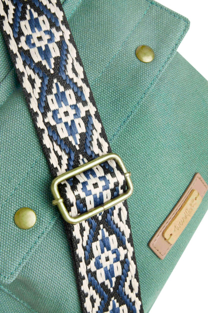 Weird Fish Ataca canvas cross body bag in Jade Green with woven blue, black and white adjustable strap.