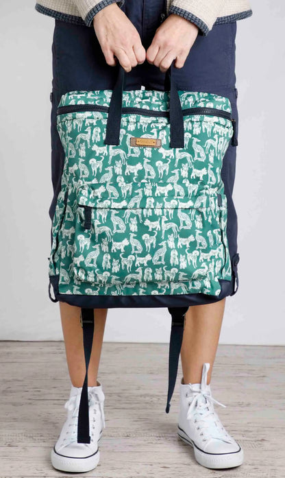 Nahla dog printed backpack from Weird Fish in Dark Jade Green with top carry handles.