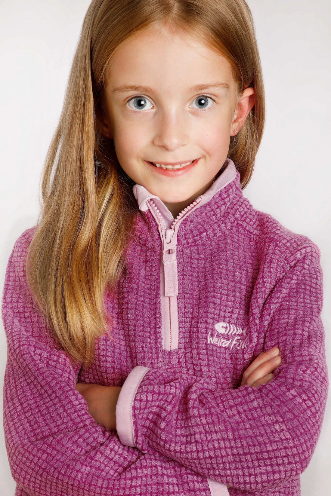 Weird Fish childrens Archie 1/4 zip grid fleece in Raspberry with pale pink trim.