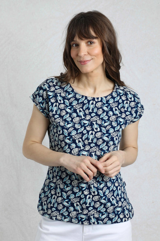 A model wearing a women's Weird Fish Paw Paw short sleeve t-shirt in Ocean Blue with a nautical / sea creatures print.