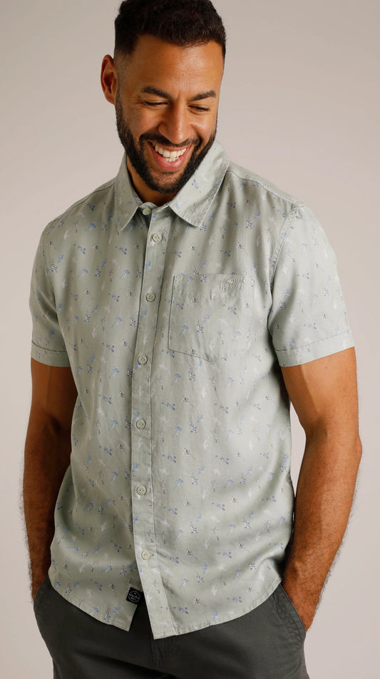 Keilor men's short sleeve shirt from Weird Fish in pistachio green with a fish pattern.