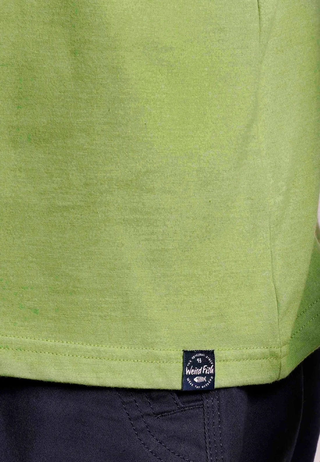 Weird Fish men's Paddle T-shirt in Kiwi Green with hem logo label.