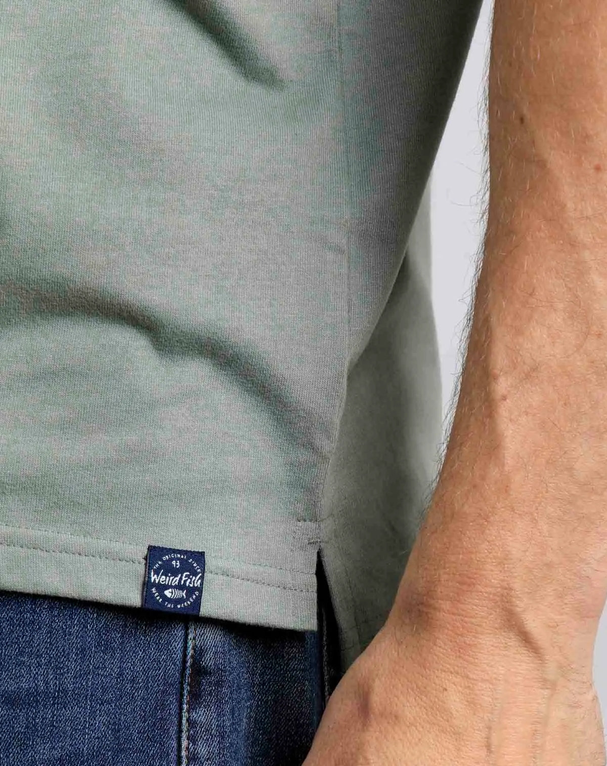 Shadow coloured men's Jetstream polo shirt from Weird Fish with hem logo label.