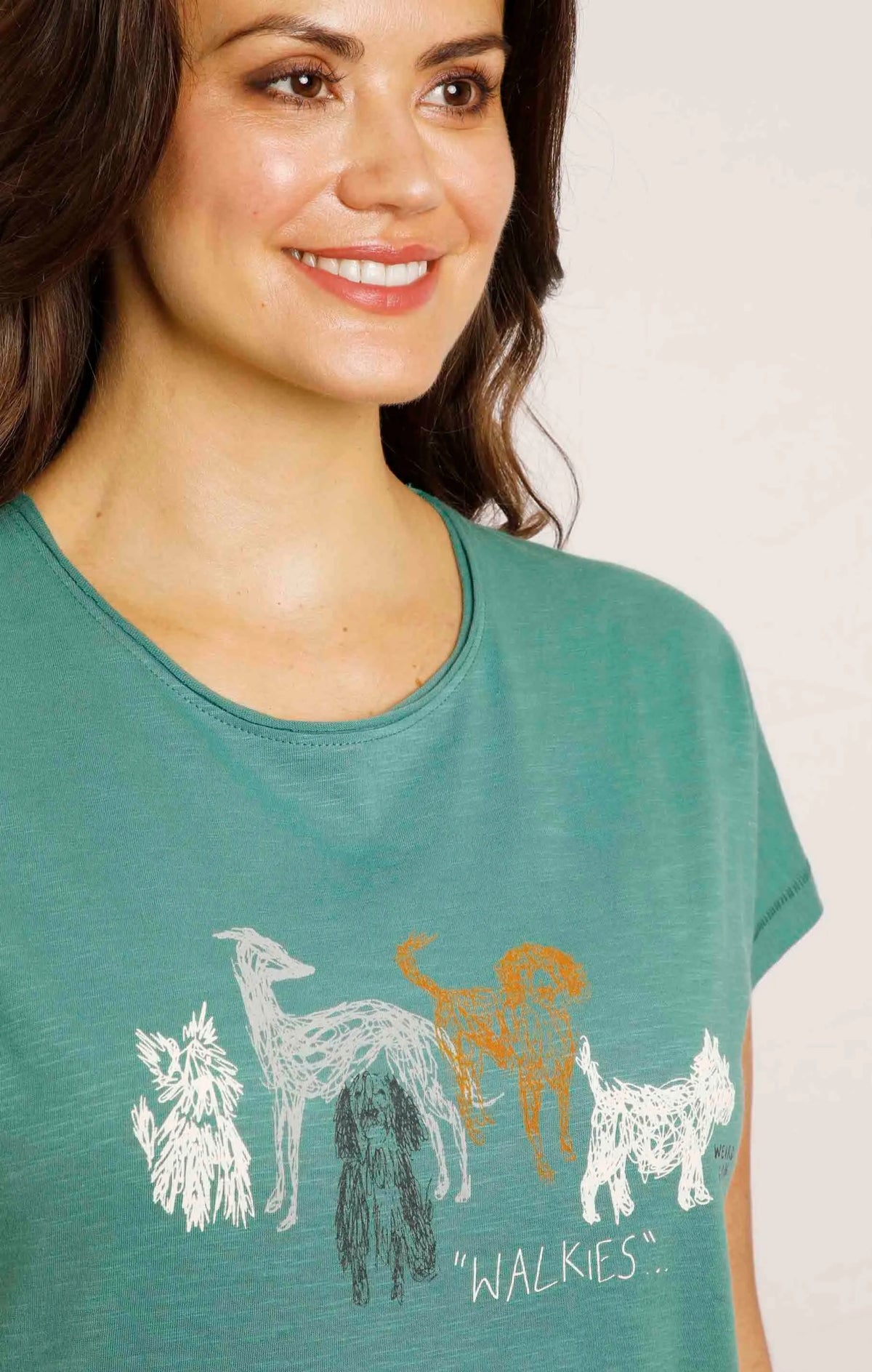 Weird Fish's 'Walkies' sketch style dog print women's t-shirt in dark jade green.