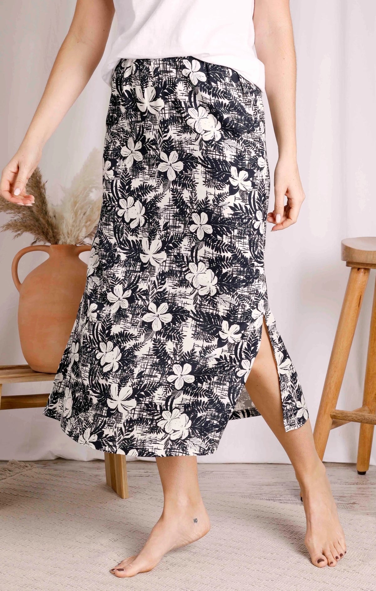 Weird Fish women's Gia viscose midi skirt in Dark Denim Blue.