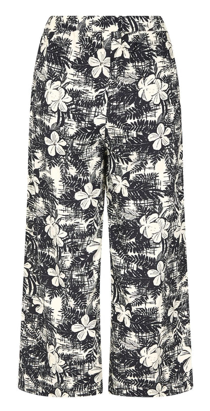 Weird Fish women's wide leg cropped Tresco trousers in Dark Denim Blue with a white floral pattern.
