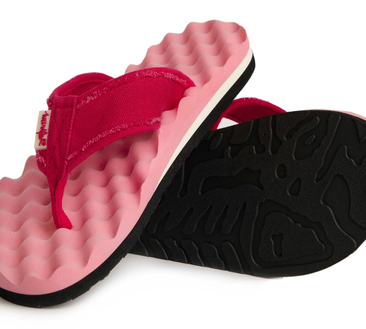 Women's Cayman flip flops from Weird Fish in Hot Pink with a bumpy waffle shaped footbed.
