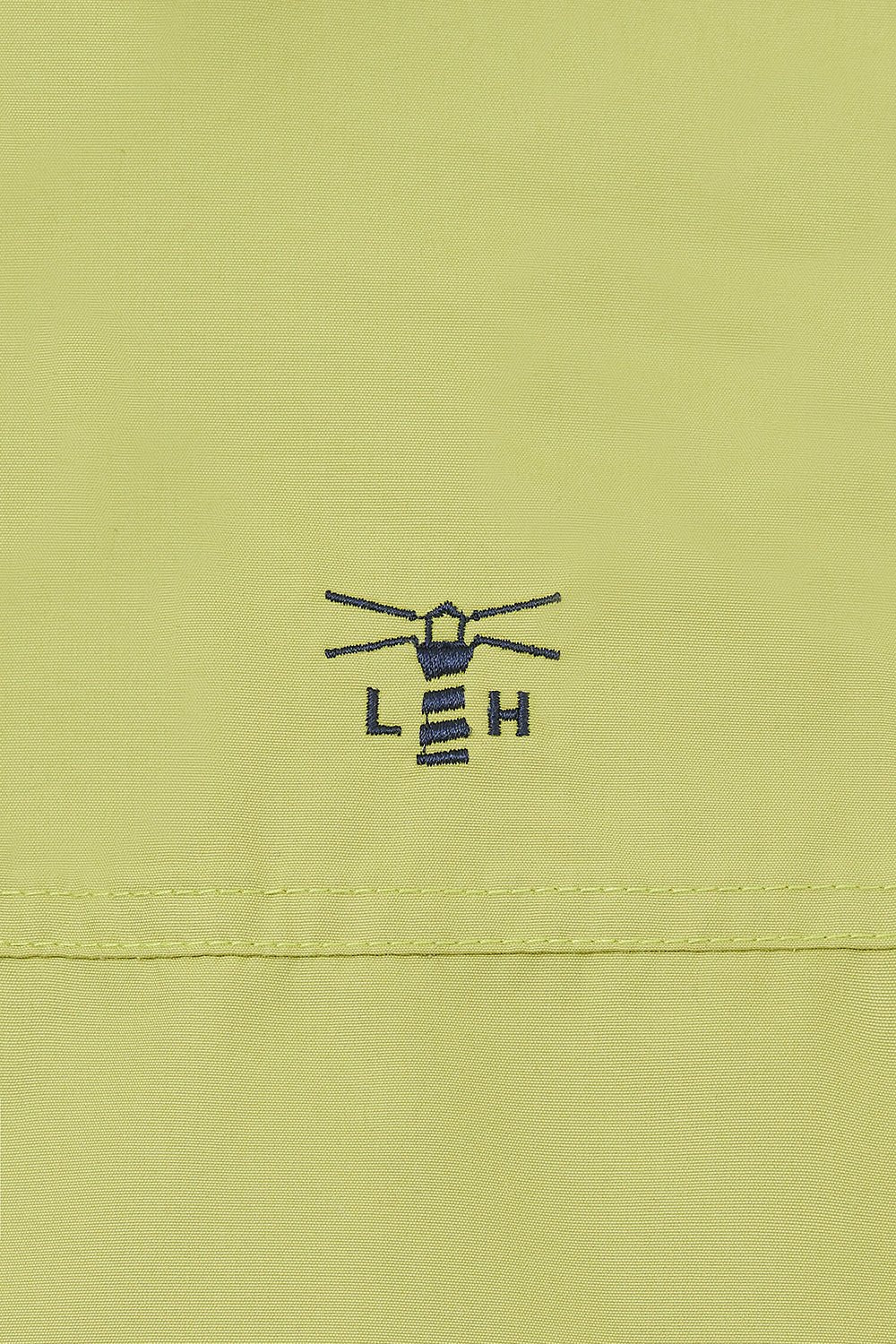 Women's waterproof padded Eva coat in Apple Green from Lighthouse with embroidered chest logo.