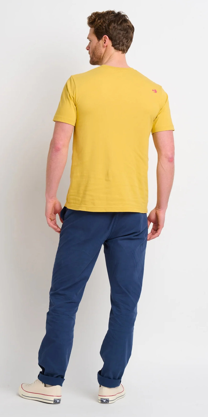 Brakeburn men's yellow t-shirt featuring a print of a bear on a bicycle carrying a surfboard