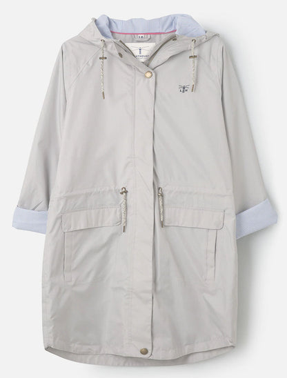 Lighthouse women's Alice waterproof rain coat in Sand colour with drawstring waist.