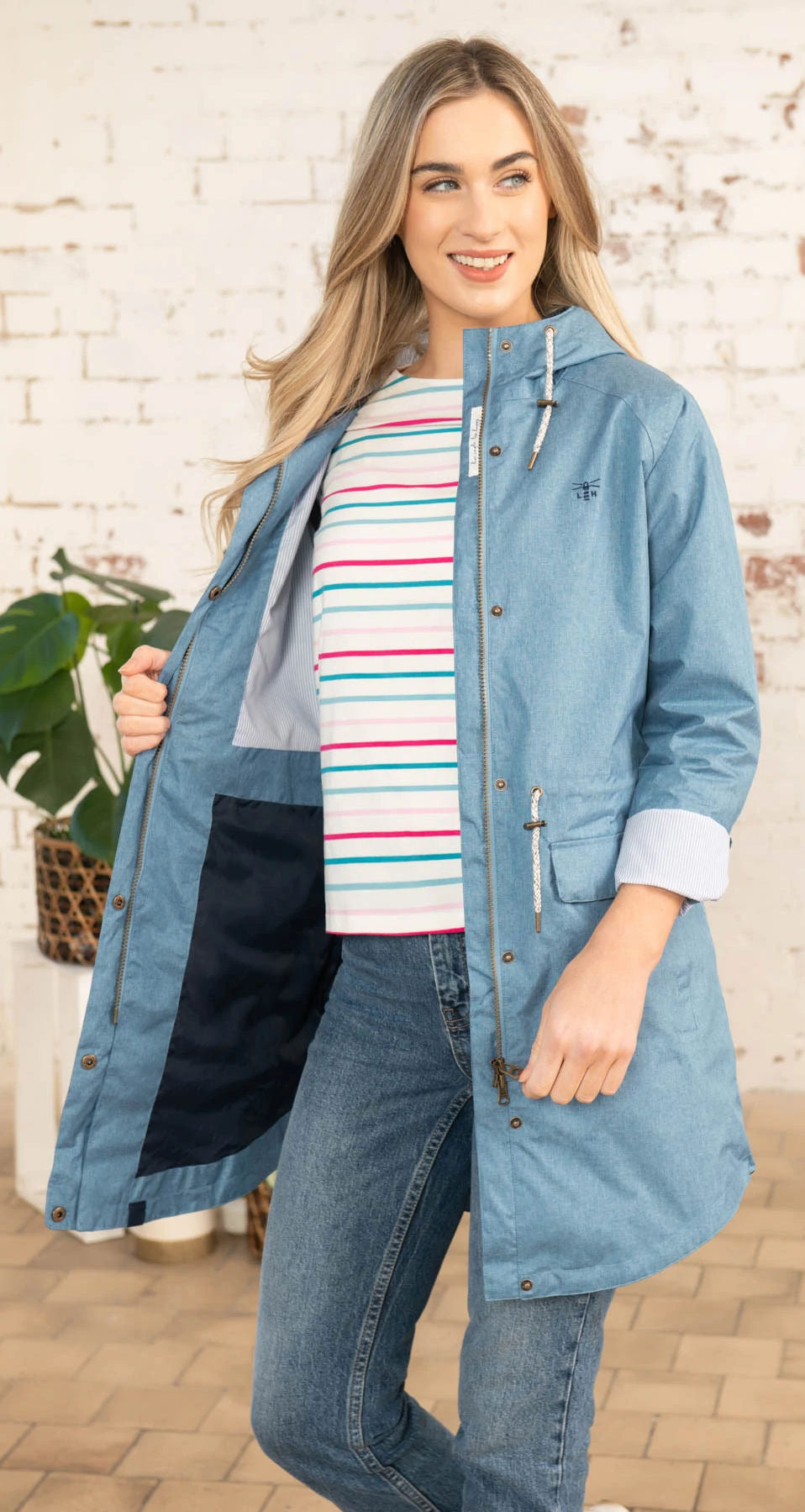 Waterproof and breathable women's Alice rain jacket in Soft Teal from Lighthouse.